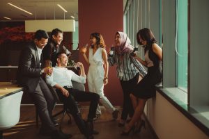 A diverse group of people sitting in an office.