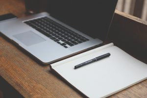 Picture of a laptop and a pencil 