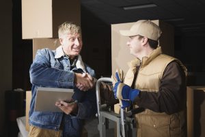 Customer shaking hands - binding moving estimate 