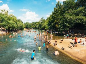 People playing in a pool.