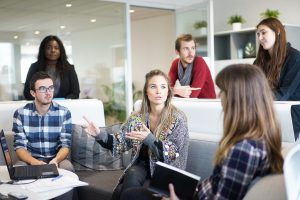 boss talking with her employees